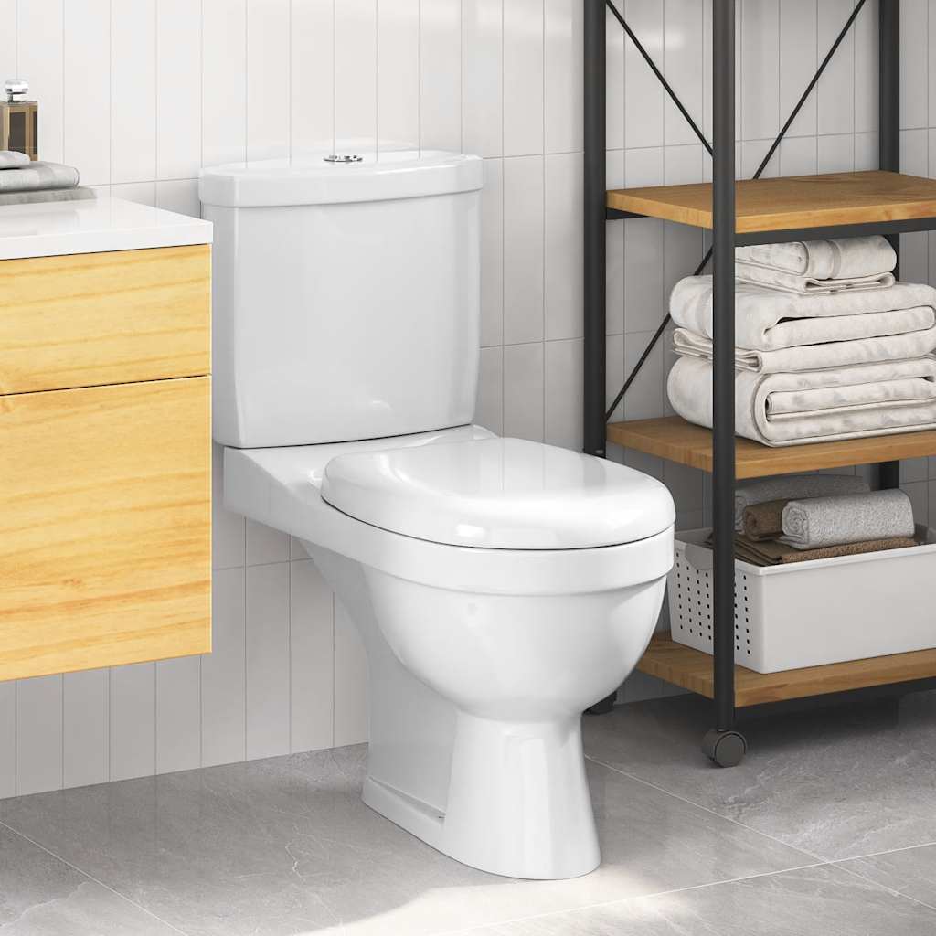 Toilette mit Spülkasten Weiß