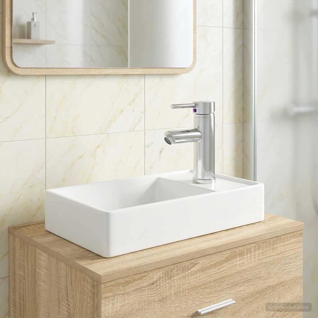 Waschbecken mit Wasserhahn und Abfluss Chrom